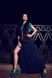 sexy stylish model in evening dress in vogue style outdoors