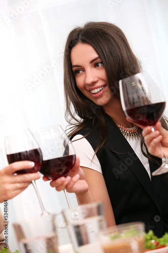 Photo: Beautiful brunette woman enjoy wine Beautiful brunette woman enjoy wine