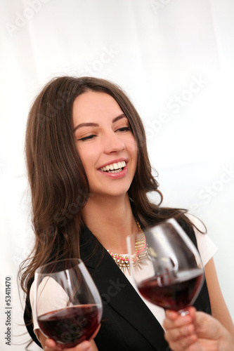 Photo: Beautiful brunette woman enjoy wine Beautiful brunette woman enjoy wine
