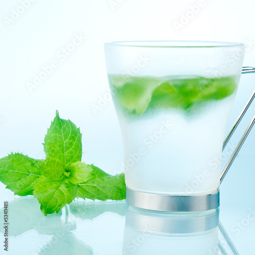 Photo: fresh mint and ice drink closeup fresh mint and ice drink closeup