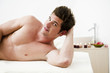 Young man relaxing in health spa