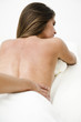 Young woman getting back massage