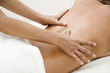 Young woman getting back massage