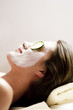 Young woman getting a facial treatment