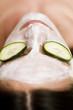 Young woman getting a facial treatment