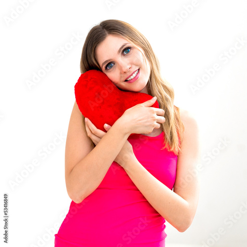 Photo: woman holding a red heart woman holding a red heart