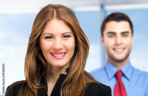 Photo: Two businesspeople in their office Two businesspeople in their office
