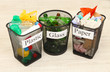 Photo: Buckets for waste sorting on room background Buckets for waste sorting on room background