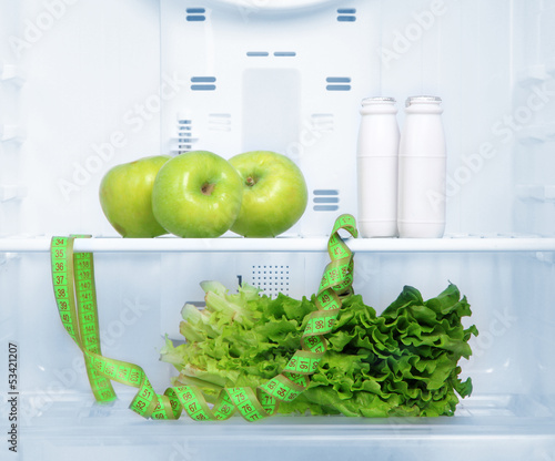 Photo: Open refrigerator with diet food Open refrigerator with diet food
