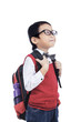 Photo: Asian nerd boy bring bag - isolated Asian nerd boy bring bag - isolated