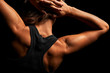 Photo: Upper body of a muscular woman from the back Upper body of a muscular woman from the back