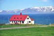 Red white house, lake and mountain