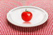 Photo: Tomato on plate Tomato on plate