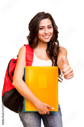 Photo: Young happy student showing thumbs up Young happy student showing thumbs up