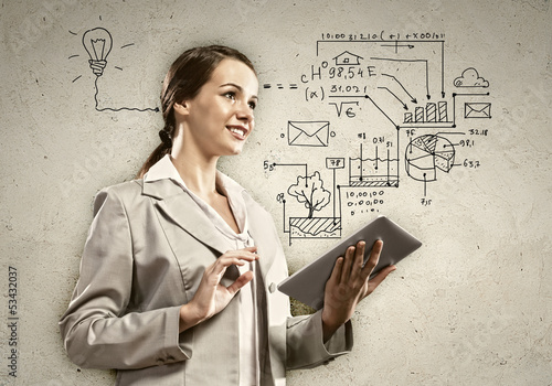 Photo: Young woman with ipad in hands Young woman with ipad in hands