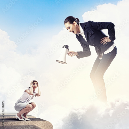 Photo: Businesswoman with megaphone Businesswoman with megaphone