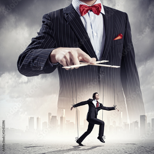 Photo: Businessman puppeteer Businessman puppeteer