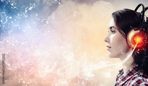 Photo: Young woman with headphones Young woman with headphones