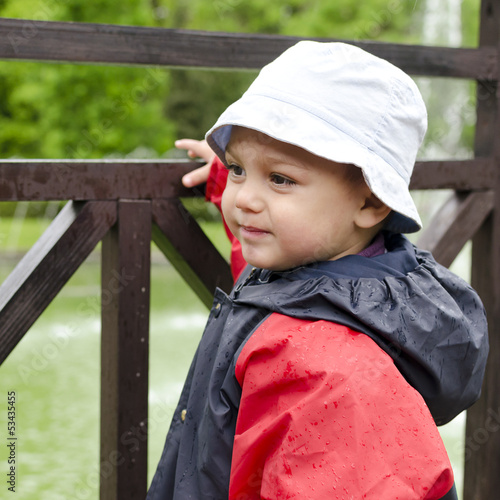 Photo: Child in rain Child in rain
