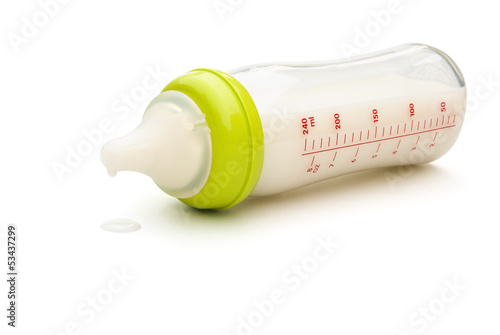 Photo: baby bottle and milk with clipping path baby bottle and milk with clipping path