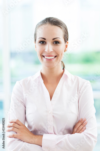 Photo: Young businesswoman smiling Young businesswoman smiling