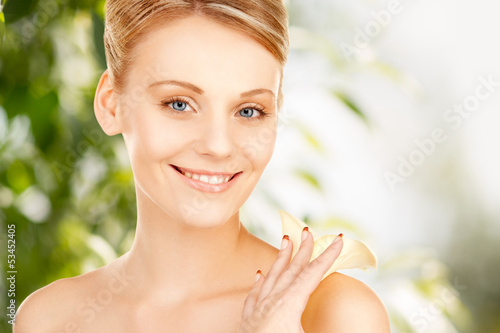 Photo: beautiful woman with calla flower beautiful woman with calla flower