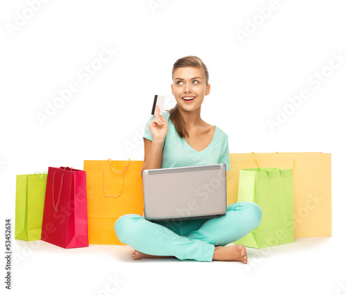 Photo: woman doing internet shopping woman doing internet shopping