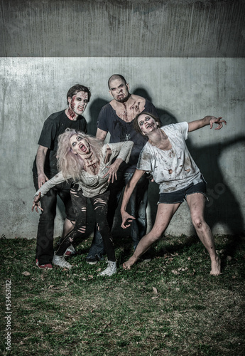 Photo: scary bloody zombies waiting for a prey scary bloody zombies waiting for a prey