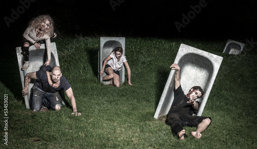 Photo: scary bloody zombies waiting for a prey scary bloody zombies waiting for a prey
