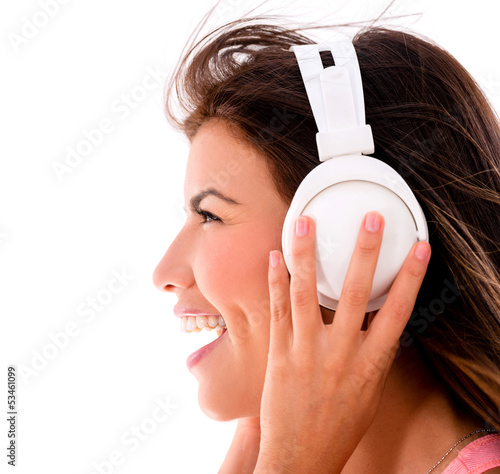 Photo: Woman listening to music Woman listening to music