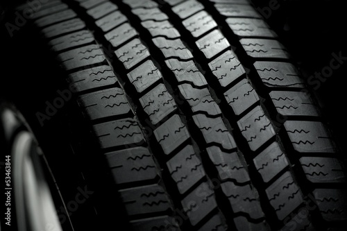 Photo: Car Tire on Black Car Tire on Black