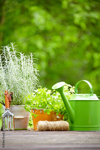 Photo: Gardening tools on the terrace in the garden Gardening tools on the terrace in the garden