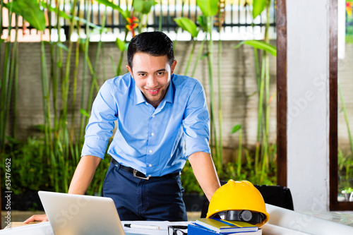 Photo: Architect working at home Architect working at home