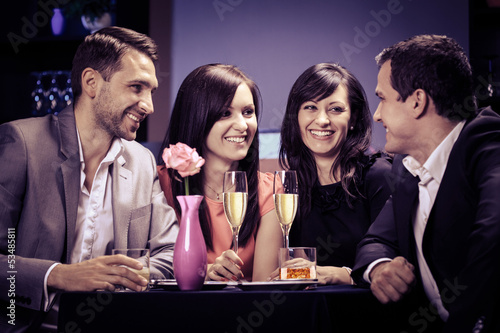 Photo: friends in a restaurant friends in a restaurant