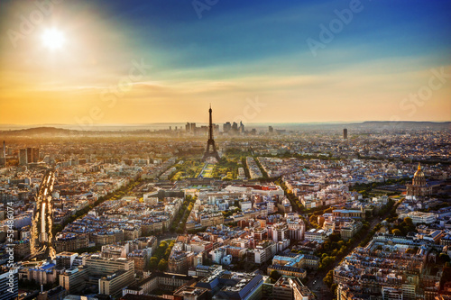 Photo: Paris, France at sunset. Aerial view on Eiffel tower, landmarks Paris, France at sunset. Aerial view on Eiffel tower, landmarks