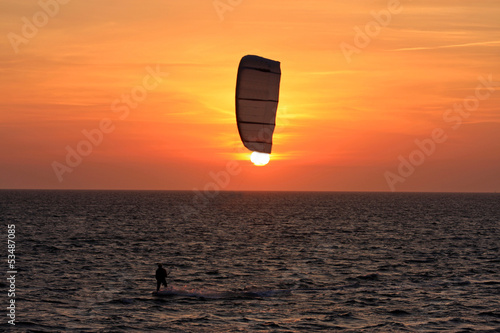 Photo: kitesurfer at sunset kitesurfer at sunset