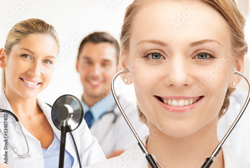 Photo: attractive female doctor with stethoscope attractive female doctor with stethoscope