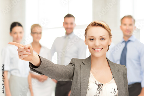 Photo: businesswoman pointing her finger businesswoman pointing her finger