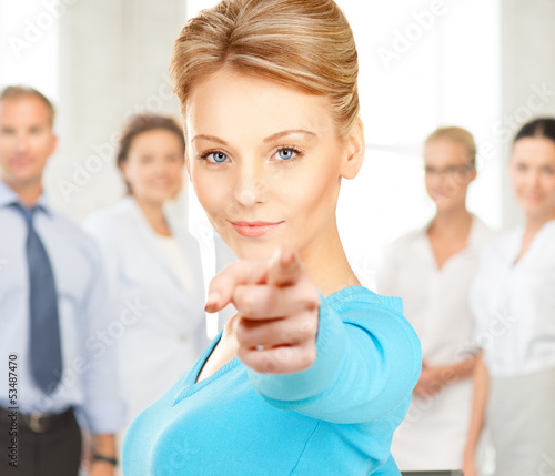 Photo: businesswoman pointing her finger businesswoman pointing her finger