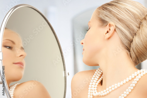 Photo: woman with pearl necklace woman with pearl necklace