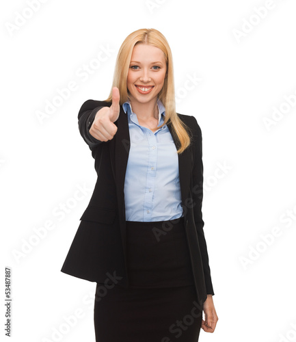 Photo: young businesswoman with thumbs up young businesswoman with thumbs up