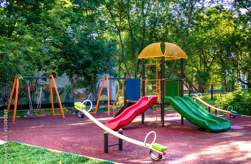 Photo: Children playground in the yard Children playground in the yard