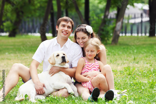 Photo: Happy family having fun outdoors Happy family having fun outdoors
