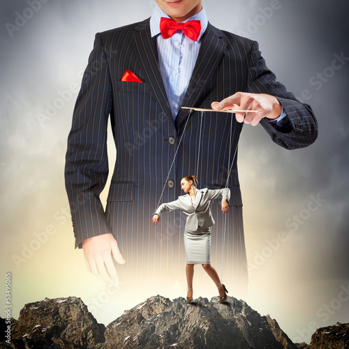 Photo: Businessman puppeteer Businessman puppeteer