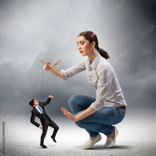 Photo: Businesswoman puppeteer Businesswoman puppeteer