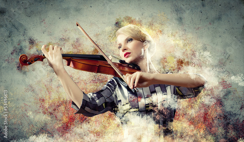 Photo: Gorgeous woman playing on violin Gorgeous woman playing on violin