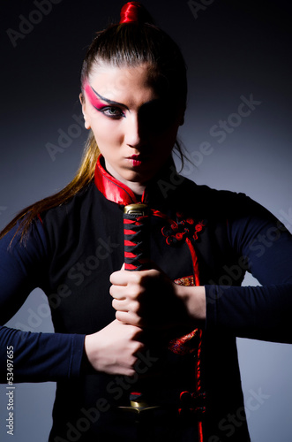 Photo: Woman in japanese martial art concept Woman in japanese martial art concept