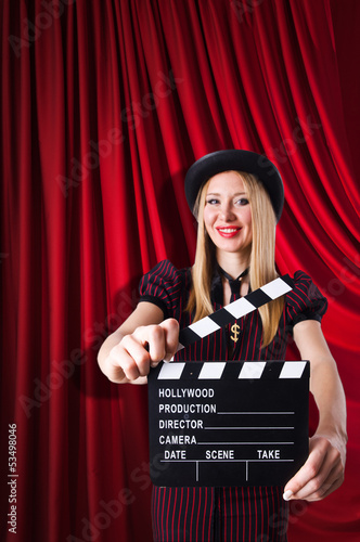 Photo: Woman gangster with movie clapper Woman gangster with movie clapper