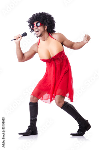 Photo: Man in female clothing singing with mic Man in female clothing singing with mic