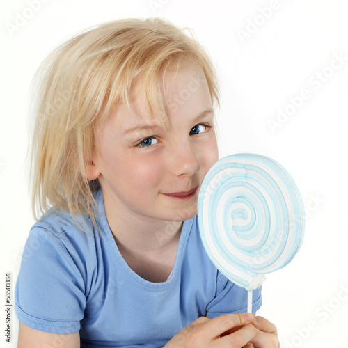 Photo: Beautiful girl with lollipop Beautiful girl with lollipop